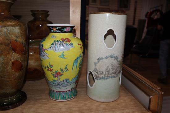 An Oriental yellow ground vase and a similar pierced sleeve vase tallest 28.5cm